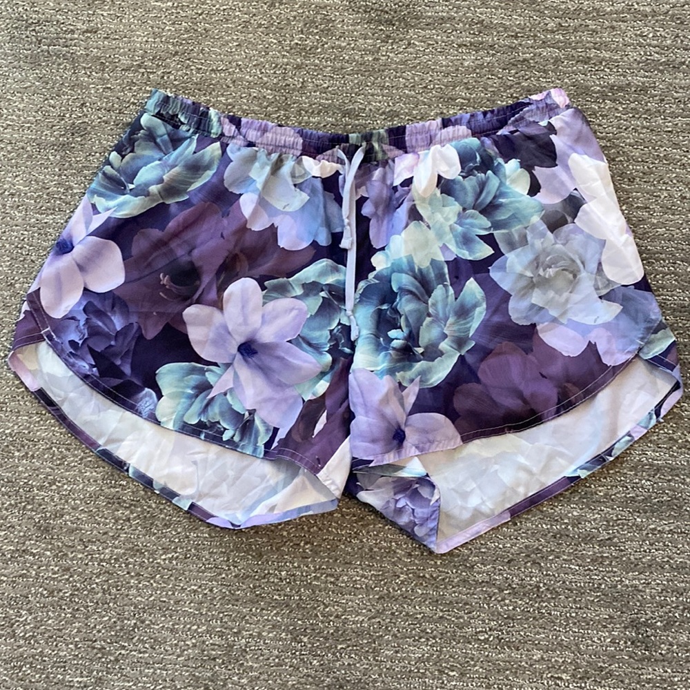 Old Navy active purple and blue floral print shorts. Size L.